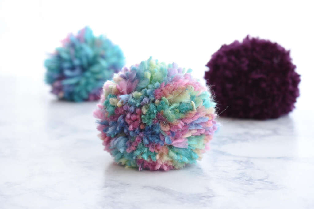 How to make a yarn pom pom with Cricut